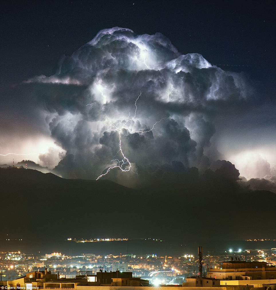 lightning storm above clouds - 1 . Caters News Agency