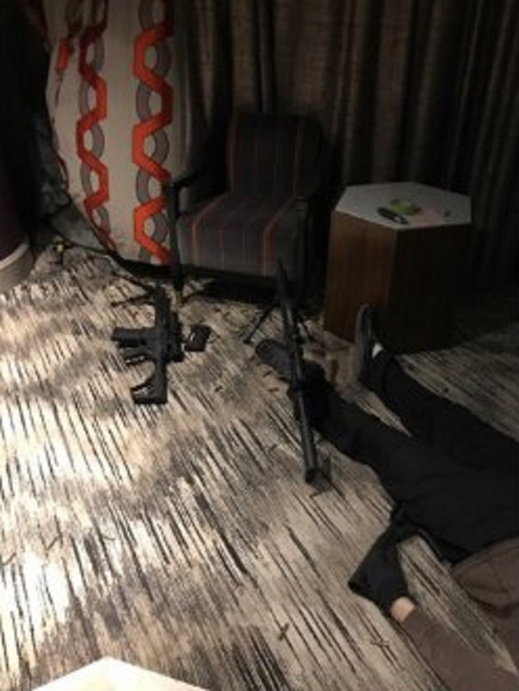 An image from inside spree killer Paddock's hotel room has been released today, which shows two of his assault weapons laying near his body