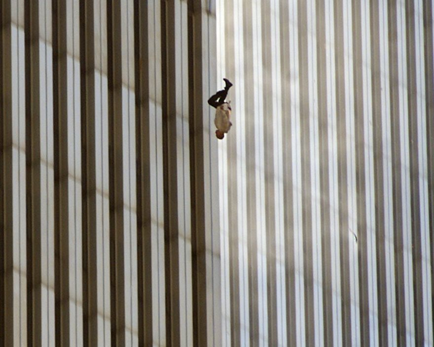 Falling Man, Richard Drew, 2001

The most widely seen images from 9/11 are of planes and towers, not people. Falling Man is different. The photo, taken by Richard Drew in the moments after the September 11, 2001, attacks, is one man’s distinct escape from the collapsing buildings, a symbol of individuality against the backdrop of faceless skyscrapers. On a day of mass tragedy, Falling Man is one of the only widely seen pictures that shows someone dying. The photo was published in newspapers around the U.S. in the days after the attacks, but backlash from readers forced it into temporary obscurity. It can be a difficult image to process, the man perfectly bisecting the iconic towers as he darts toward the earth like an arrow. Falling Man’s identity is still unknown, but he is believed to have been an employee at the Windows on the World restaurant, which sat atop the north tower. The true power of Falling Man, however, is less about who its subject was and more about what he became: a makeshift Unknown Soldier in an often unknown and uncertain war, suspended forever in history.