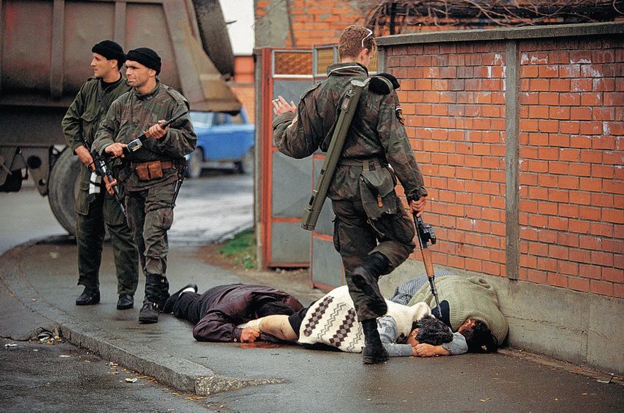 Bosnia, Ron Haviv, 1992. It can take time for even the most shocking ­images to have an effect. The war in Bosnia had not yet begun when American Ron Haviv took this picture of a Serb kicking a Muslim woman who had been shot by Serb forces. Haviv had gained access to the Tigers, a brutal nationalist militia that had warned him not to photograph any killings. But Haviv was determined to document the cruelty he was witnessing and, in a split second, decided to risk it. TIME published the photo a week later, and the image of casual hatred ignited broad debate over the international response to the worsening conflict. Still, the war continued for more than three years, and ­Haviv—who was put on a hit list by the Tigers’ leader, Zeljko Raznatovic, or ­Arkan—was frustrated by the tepid reaction. Almost 100,000 people lost their lives. Before his assassination in 2000, Arkan was indicted for crimes against humanity. Haviv’s image was used as evidence against him and other perpetrators of what became known as ethnic cleansing.