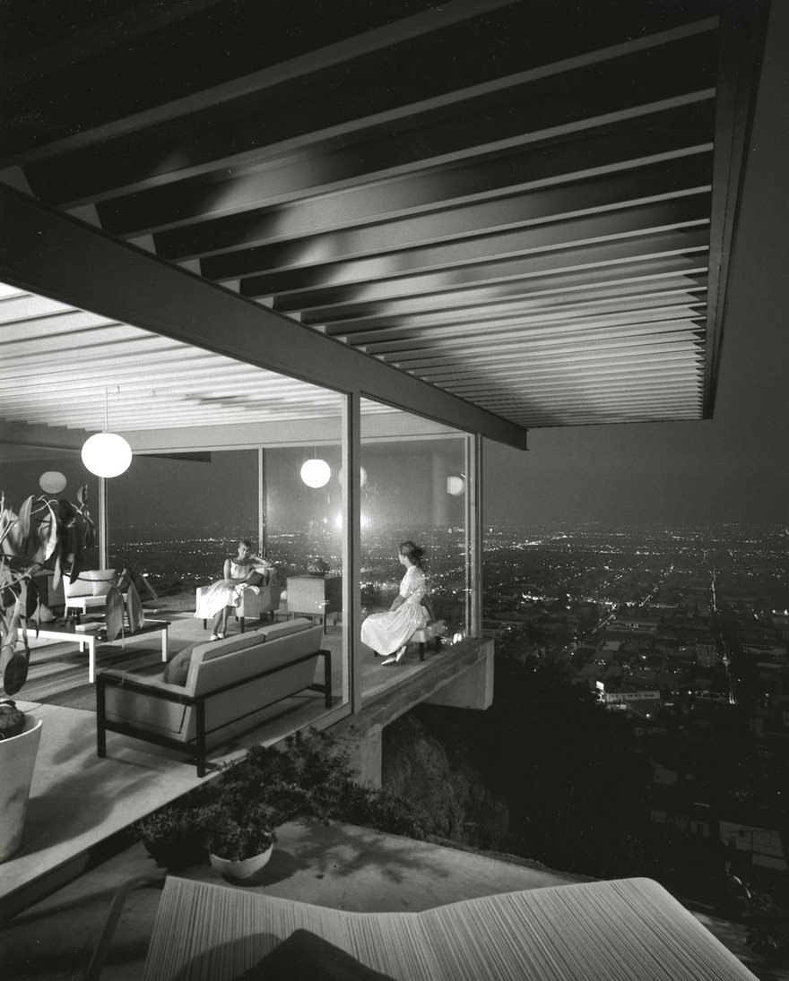 Case Study House No. 22, Los Angeles, Julius Shulman, 1960. For decades, the California Dream meant the chance to own a stucco home on a sliver of paradise. The point was the yard with the palm trees, not the contour of the walls. Julius Shulman helped change all that. In May 1960, the Brooklyn-born photographer headed to architect Pierre Koenig’s Stahl House, a glass-­enclosed Hollywood Hills home with a breathtaking view of Los Angeles—one of 36 Case Study Houses that were part of an architectural experiment extolling the virtues of modernist theory and industrial materials. Shulman photographed most of the houses in the project, helping demystify modernism by highlighting its graceful simplicity and humanizing its angular edges. But none of his other pictures was more influential than the one he took of Case Study House No. 22. To show the essence of this air-breaking cantilevered building, Shulman set two glamorous women in cocktail dresses inside the house, where they appear to be floating above a mythic, twinkling city. The photo, which he called “one of my masterpieces,” is the most successful real estate image ever taken. It perfected the art of aspirational staging, turning a house into the embodiment of the Good Life, of stardusted Hollywood, of California as the Promised Land. And, thanks to Shulman, that dream now includes a glass box in the sky.