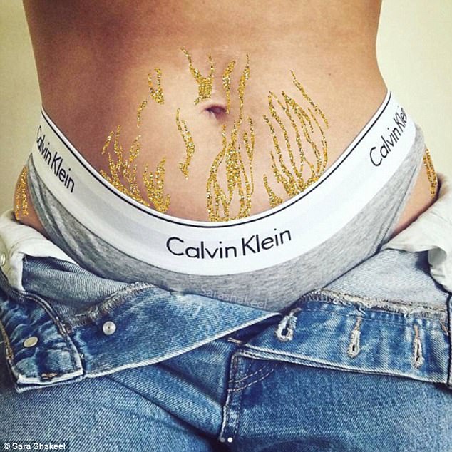 Owning the stripes! Artist celebrates women's stretch marks on Instagram by covering them in glitter