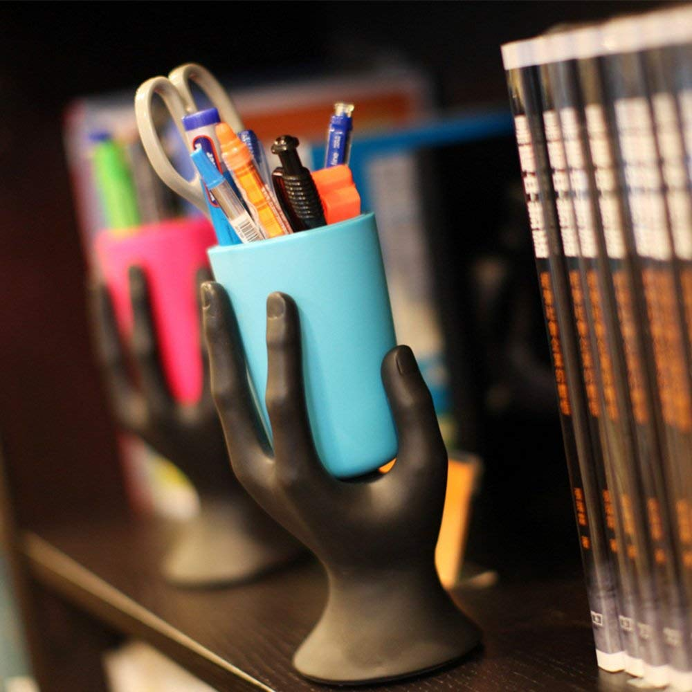 Your pens get lonely when they're not in your hand. You can keep them occupied when you're away with this nifty hand holder.<br><br>Spruce up your workspace by buying one <a href=https://amzn.to/2MkhZ4i "nofollow" target="_blank">here</a>.