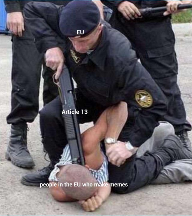 Article 13 meme with a man pointing a gun at someone with the words, 'people in the EU who make memes'