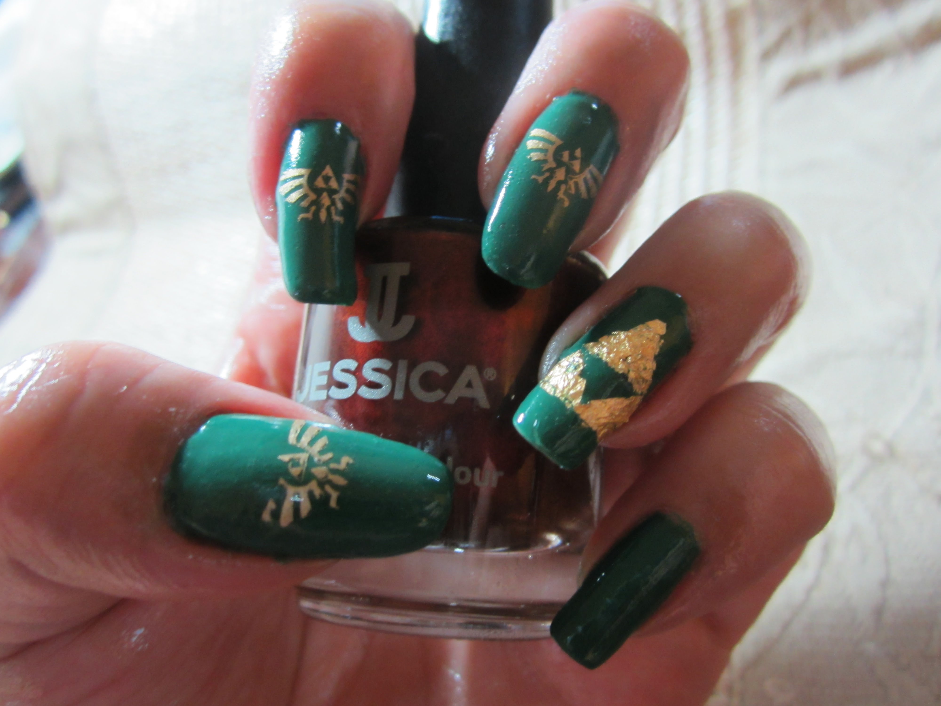 Some cool Green and Gold Zelda inspired nails, my personal favorite