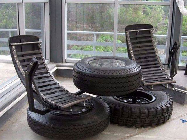 chairs made out of old car tires and parts