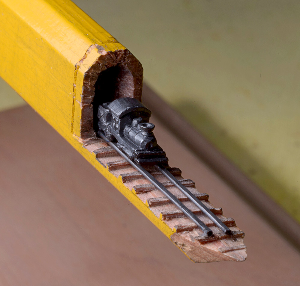 train carved into pencil