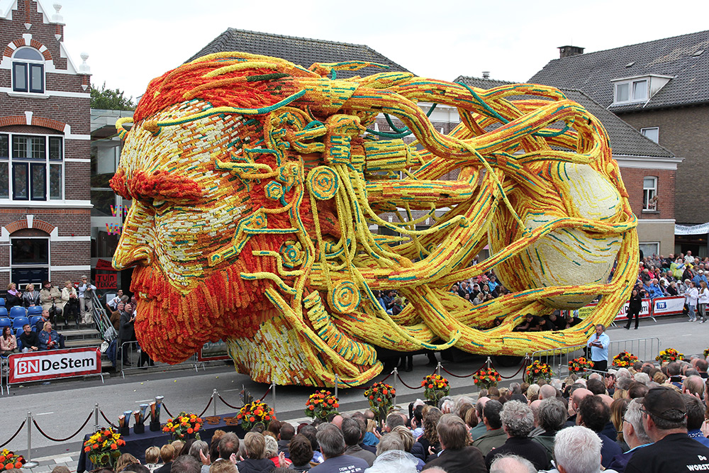 Van Gogh flat in a parade, presumable in Europe based on the architechture in the background.