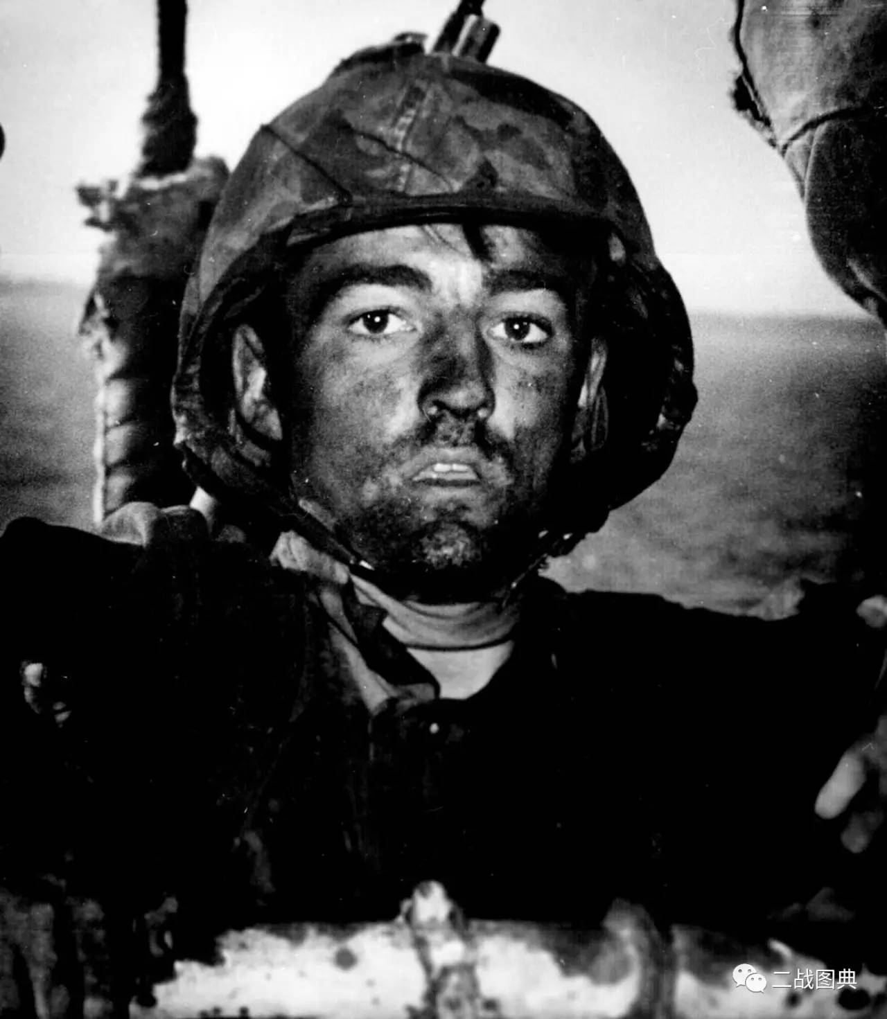 An exhausted U.S. Marine exhibits the thousand-yard stare after two days of constant fighting at the Battle of Eniwetok, February 1944.