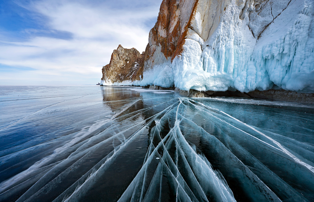 Ice cracks and rock cliffs with ice