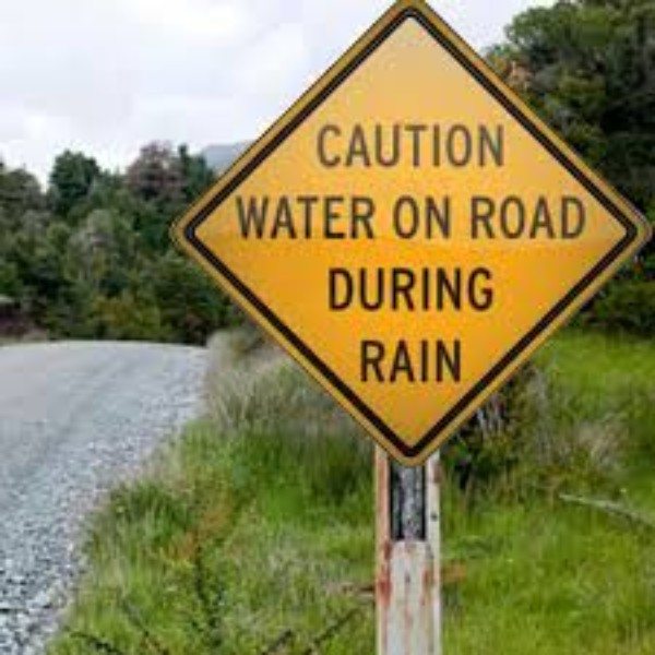 funny road signs - Caution Water On Road During Rain