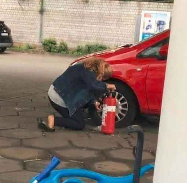 meme - woman trying to pump her tires