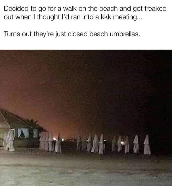 memes - kkk beach umbrella - Decided to go for a walk on the beach and got freaked out when I thought I'd ran into a kkk meeting... Turns out they're just closed beach umbrellas.