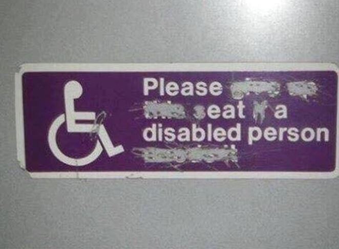 label - Please seat a disabled person