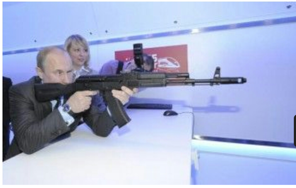 meme - Putin holding a gun and doing karate