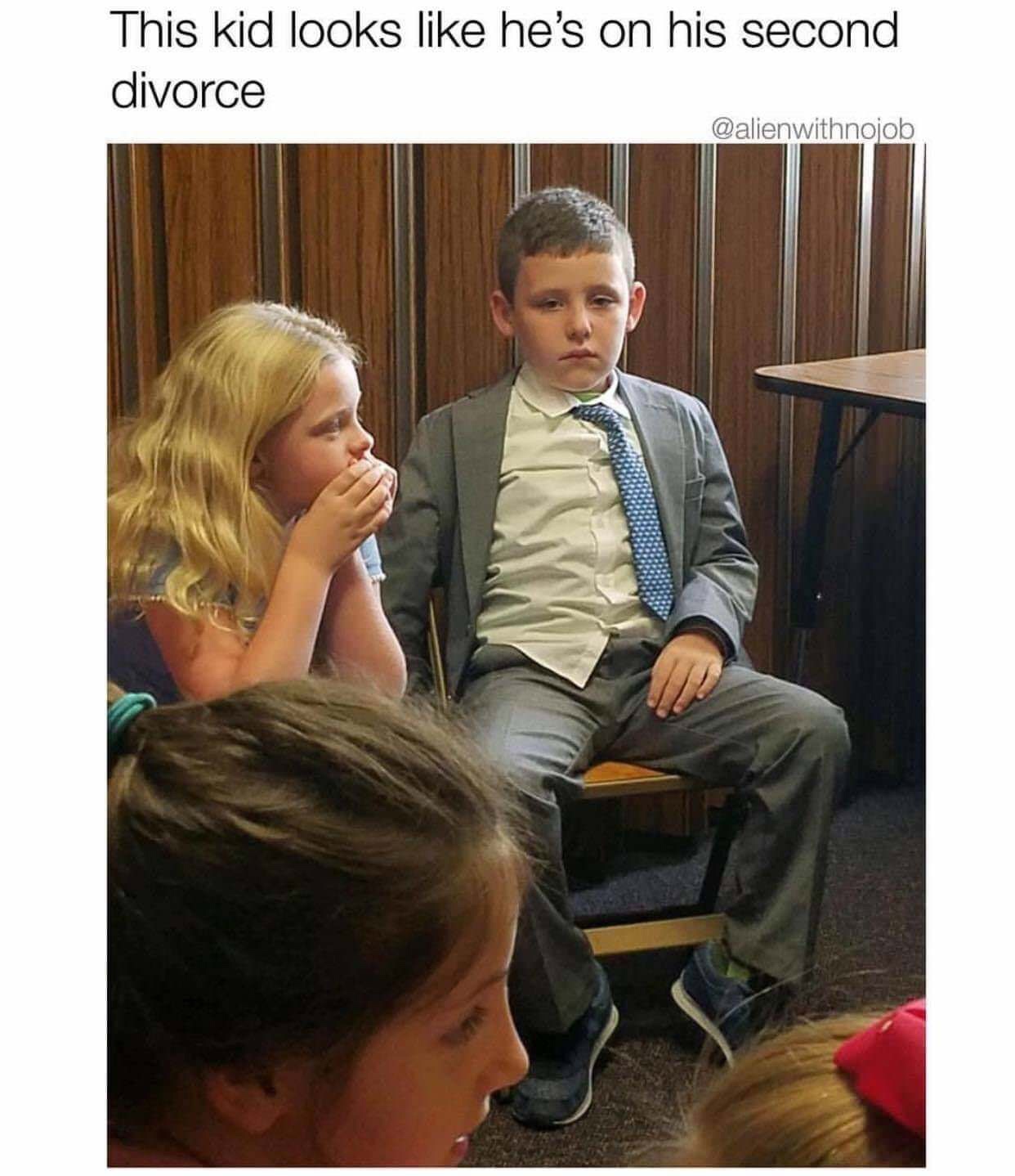 kid looks like he's on his second divorce - This kid looks he's on his second divorce
