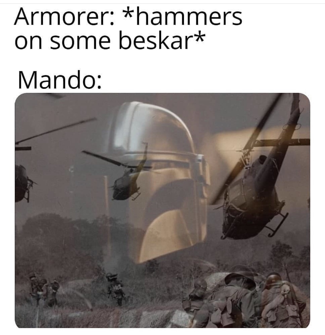 photo caption - Armorer hammers on some beskar Mando