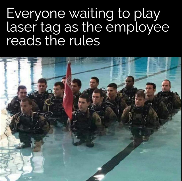midgets swimming - Everyone waiting to play laser tag as the employee reads the rules