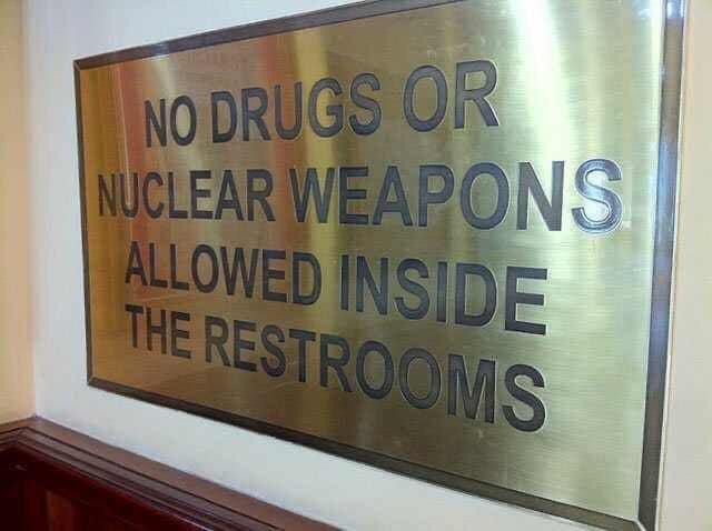 sign - No Drugs Or Uclear Weapons Allowed Inside The Restrooms