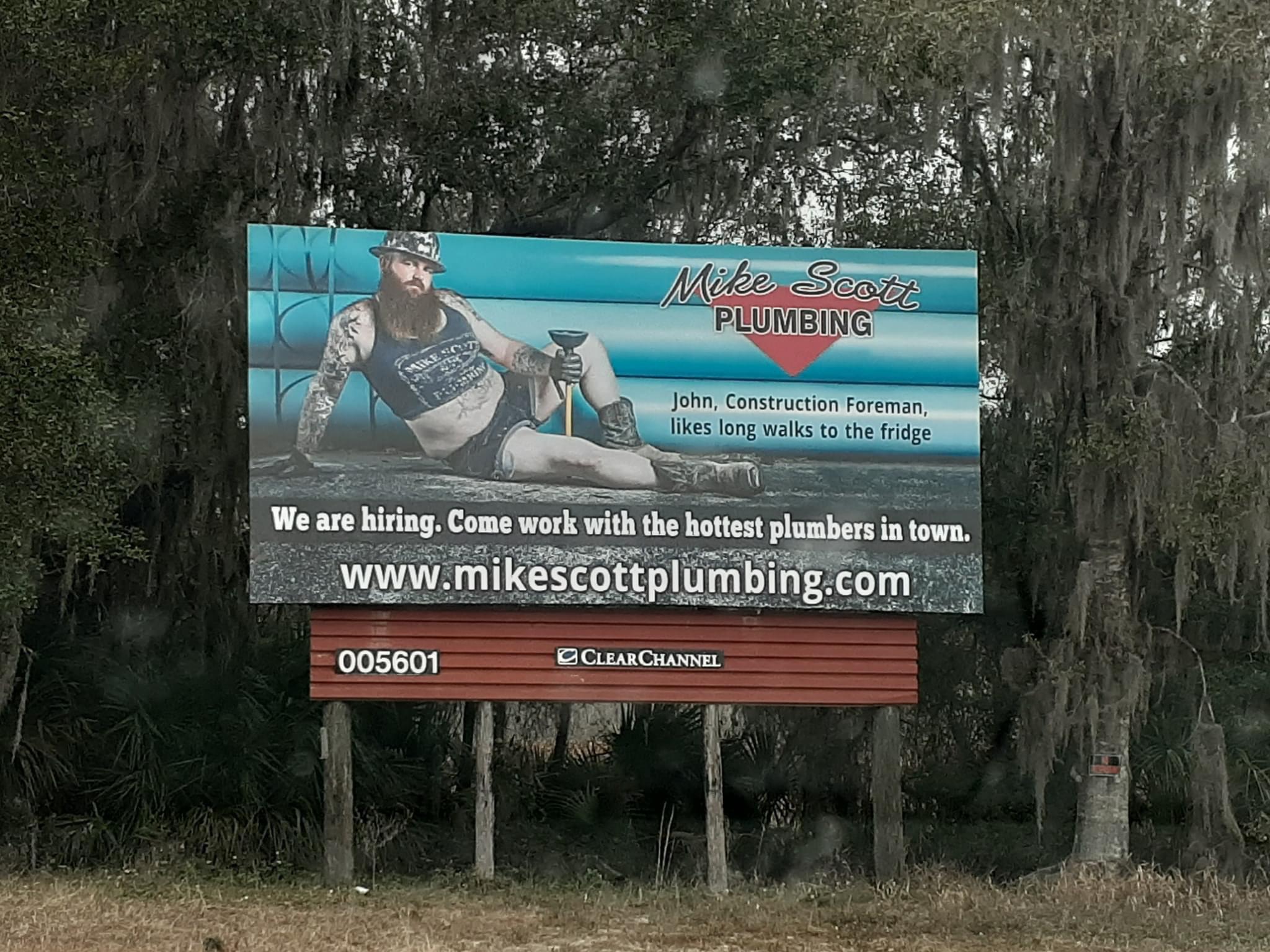 billboard - Mike Scott Plumbing John, Construction Foreman, long walks to the fridge We are hiring. Come work with the hottest plumbers in town. 005601 Clear Channel