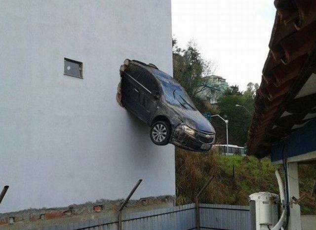 car coming through a building