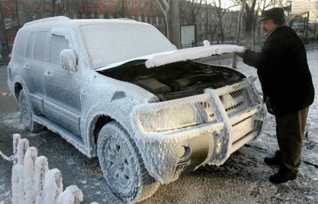 car with frozen ice all over it