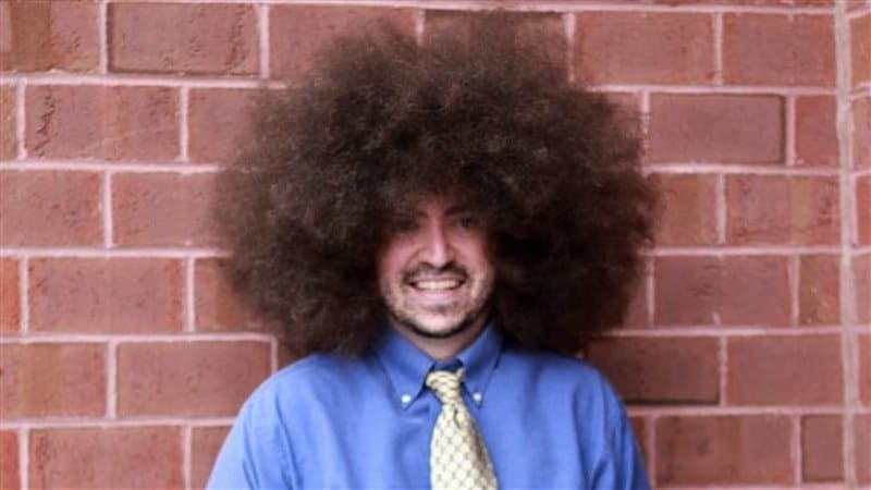 Largest Afro

Alan Edward Labbe’s enormous afro is 5.75 inches tall, 8.5 inches wide, and has a circumference of about 5 feet. We have to give this guy respect for his effort: it must be extremely challenging to take showers with such a hairdo.