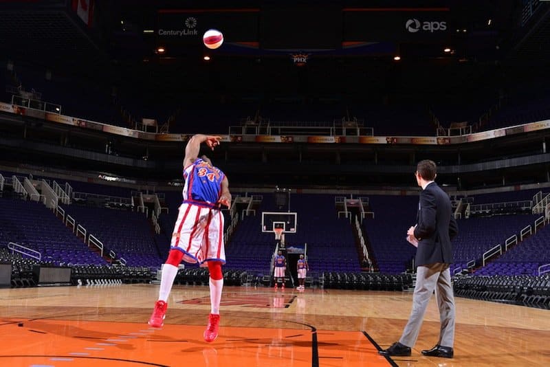 The Longest Basketball Shot Facing Backwards

The Harlem Globetrotters’s Thunder Law made a shot of 82 feet, 2 inches at the US Airways Center. He was standing backwards and used only one hand. He claimed that as soon as the basketball left his hand, he could tell it was going to be a made shot. Master Yoda would be proud.