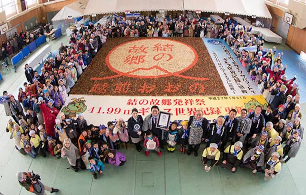 Largest Sushi Mosaic

This mosaic was made with mackerel and imitation crab meat. It measures 451 square feet, 140 inches and was crafted in Ono, Fukui, Japan by the Young Entrepreneurs Group. The question on our minds is did they get to eat their own handiwork afterwards?