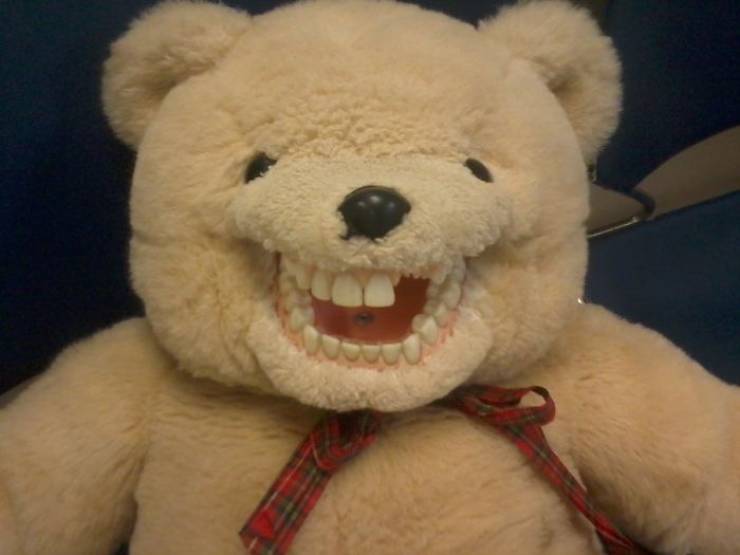 creepy teddy bear with teeth