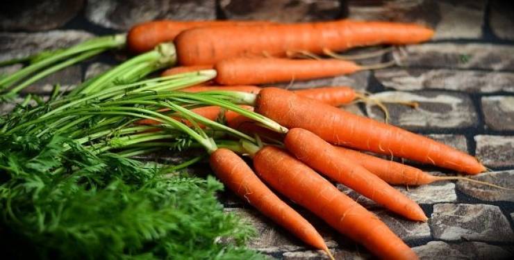If you eat three large carrots a day your skin could very well legitimately turn orange.