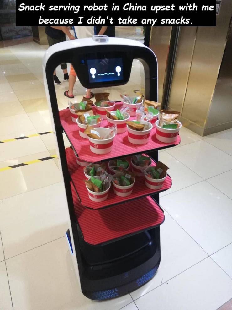 small appliance - Snack serving robot in China upset with me! because I didn't take any snacks.