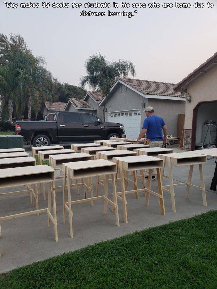 funny random pics - table - "Guy makes 35 desks for students in his area who are home due to distance learning.
