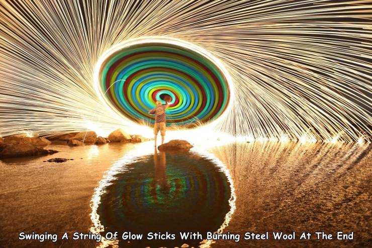 long exposure steel wool - Swinging A String Of Glow Sticks With Burning Steel Wool At The End