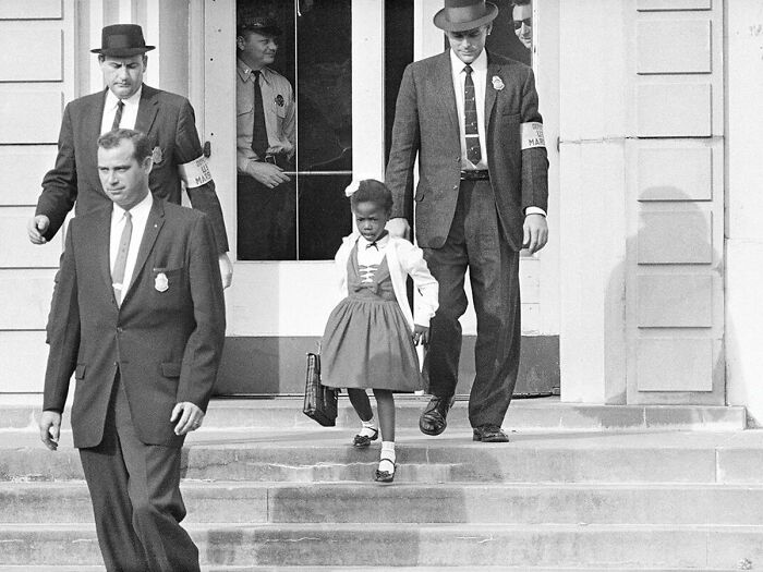 Brave Ruby Bridges, 6 Years Old, To School In 1960. This Courageous Young Girl Is Known For Being The First African American Child To Attend An All-White Elementary School In The South