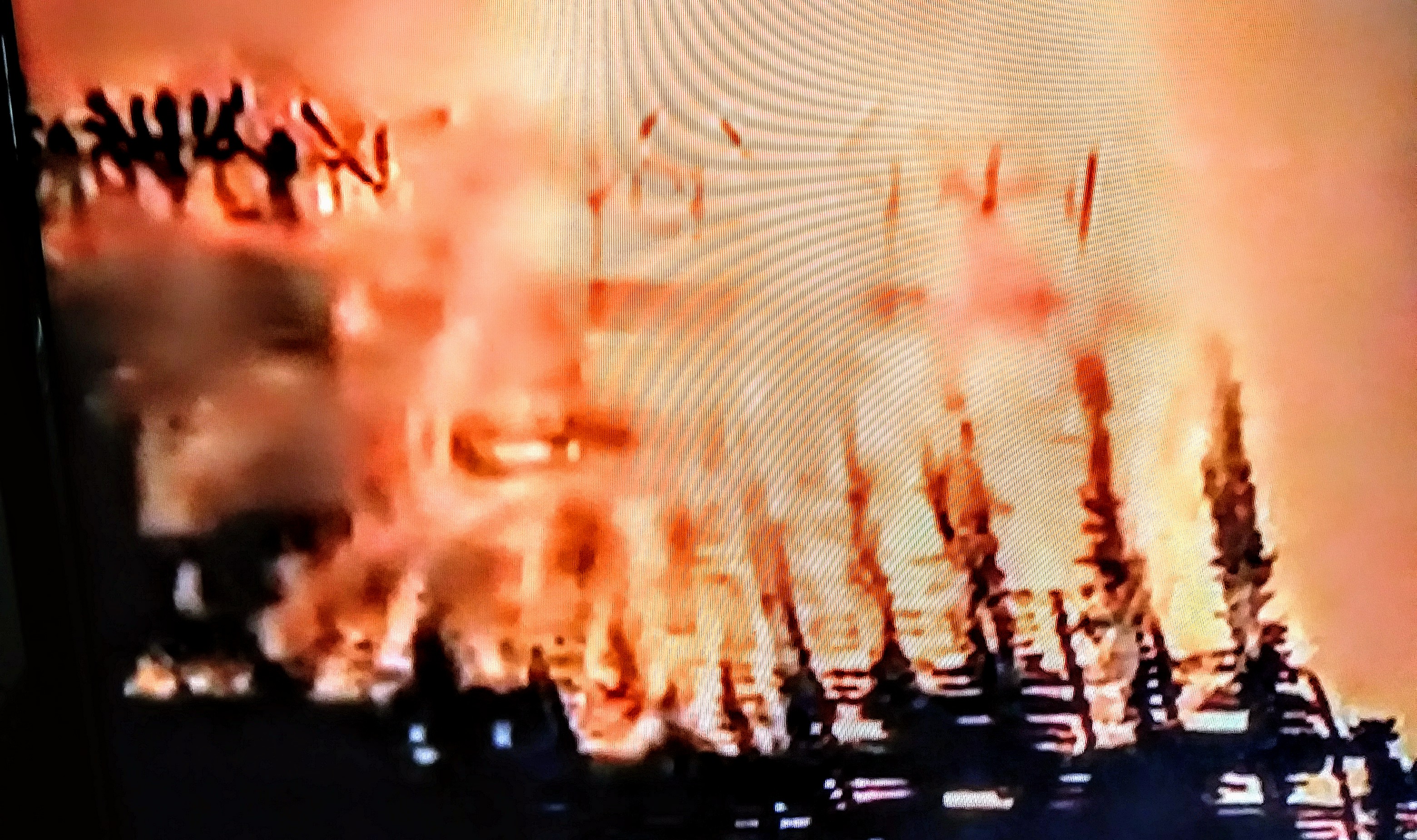 My wife paused the tv and there are clearly faces in the flames.