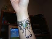 My wifes awesome butterfly tat