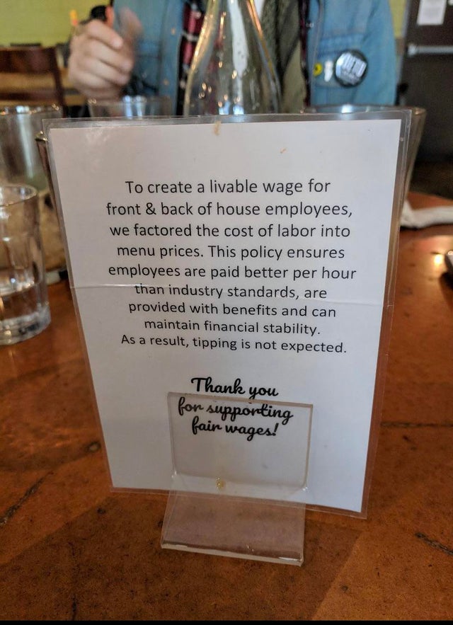 trophy - To create a livable wage for front & back of house employees, we factored the cost of labor into menu prices. This policy ensures employees are paid better per hour than industry standards, are provided with benefits and can maintain financial st