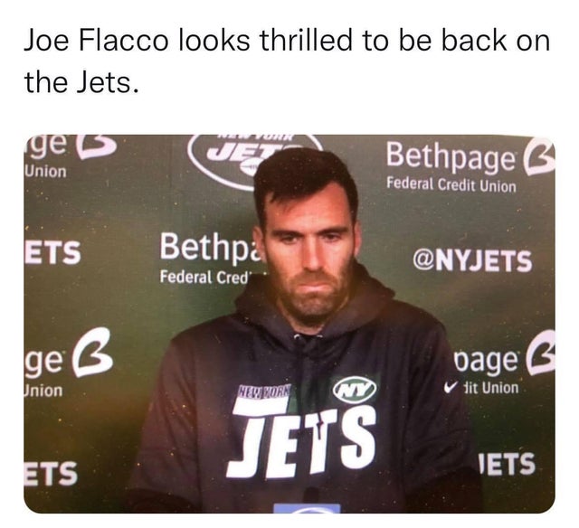 photo caption - Joe Flacco looks thrilled to be back on the Jets. Von ges Jet Bethpage 6 Union Federal Credit Union Ets Bethpa Federal Cred ge bage Union New Born W V dit Union Jets Ets Jets