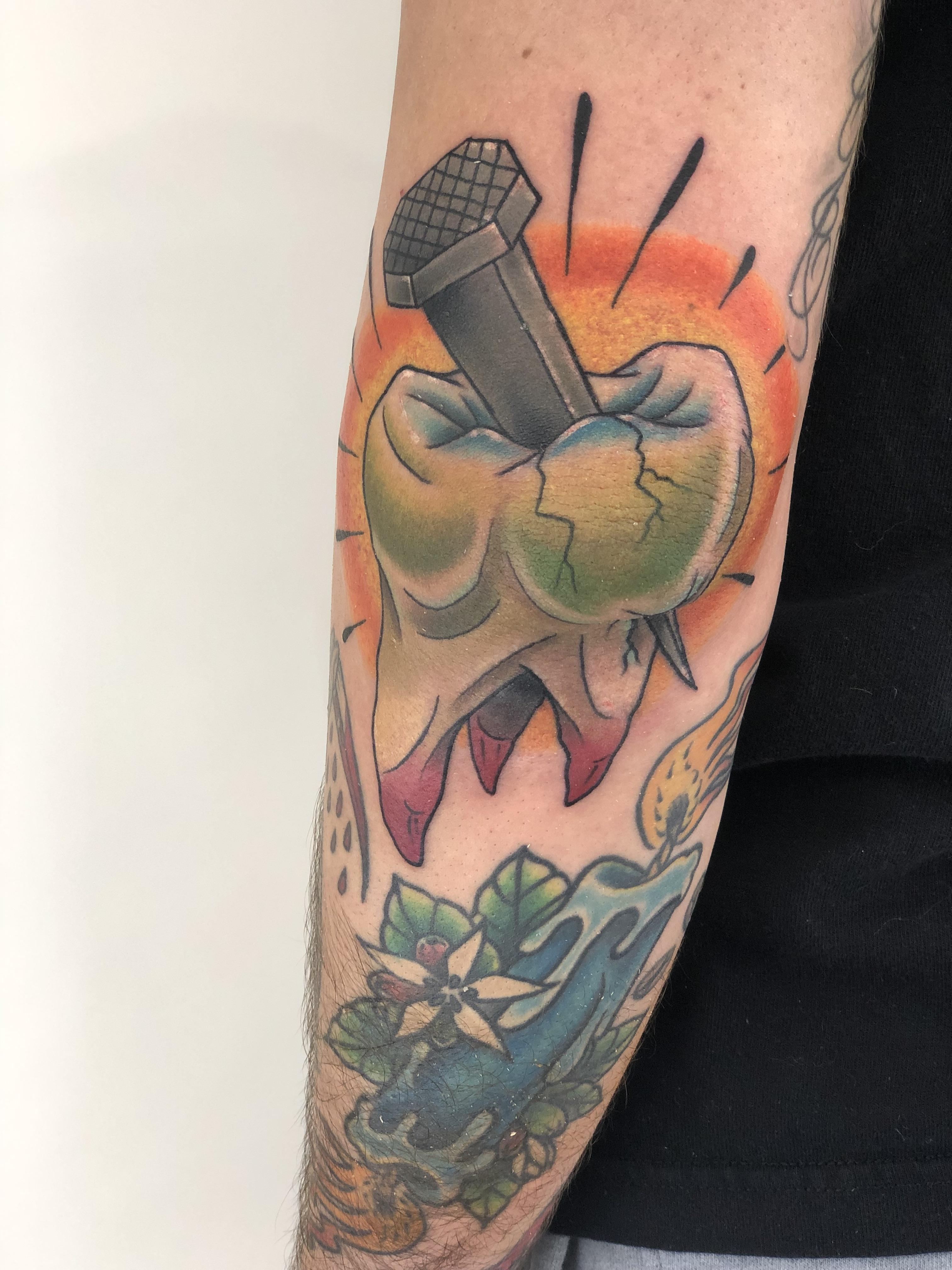 neo traditional elbow tattoo