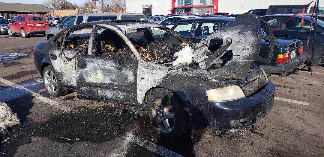 Just a Audi (don't know the model) sitting in a parking lot a few days after a fire.