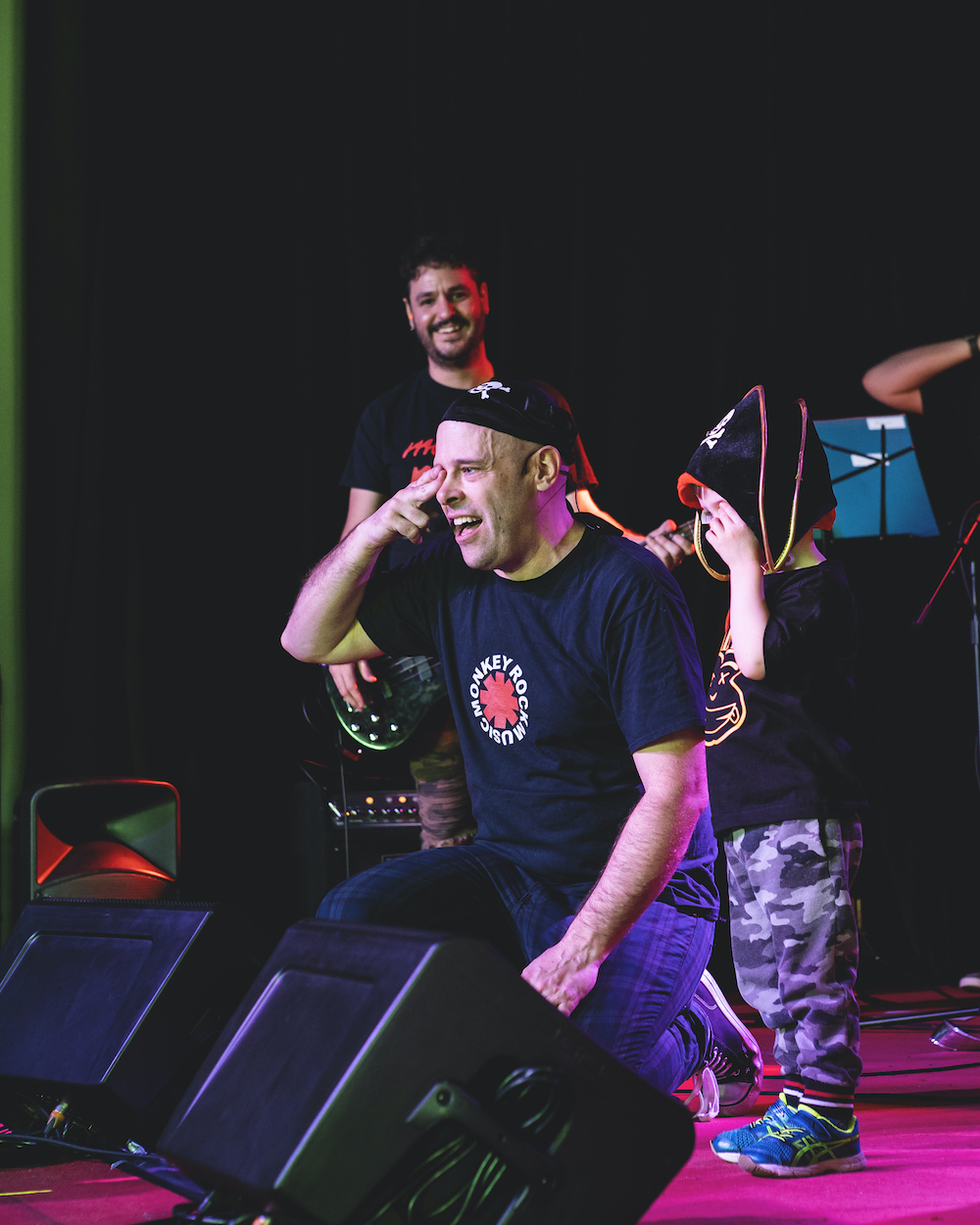 This Kids' Rock Band's members all wear shirts tributing other bands