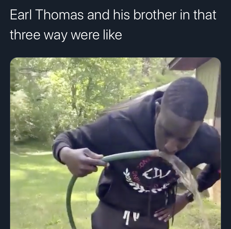 photo caption - Earl Thomas and his brother in that three way were