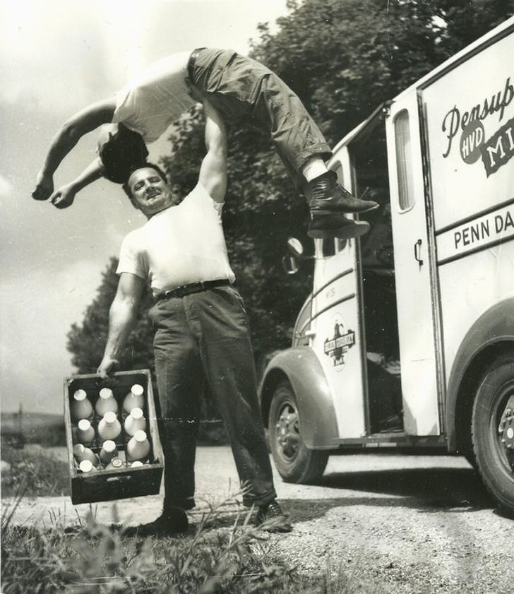 my weight lifter great grandpa holding my grandpa over his head 1947