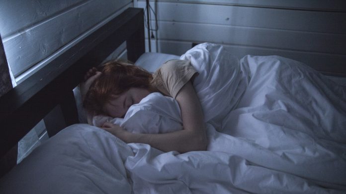 3am things - woman sleeping in bed