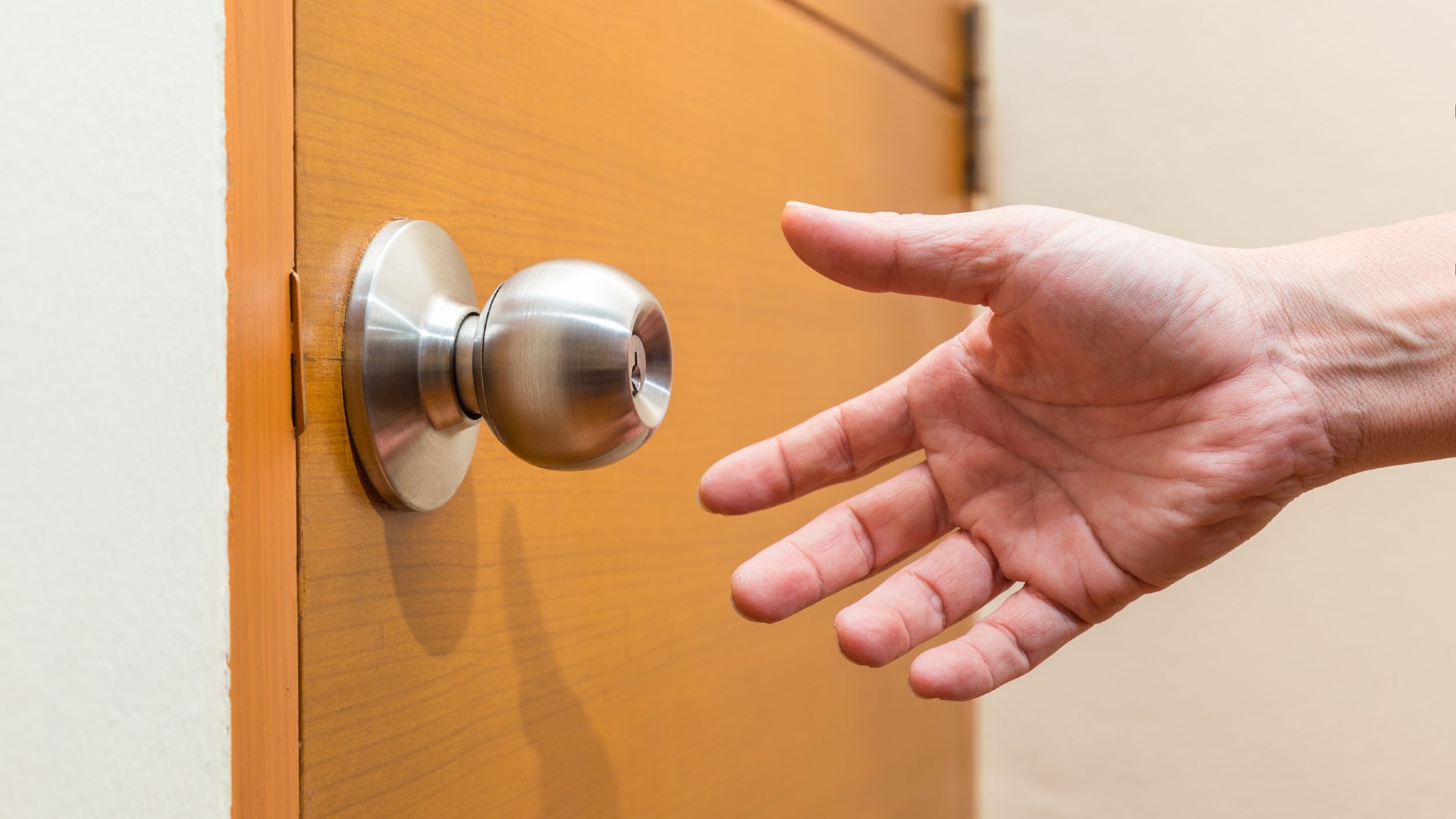 Pre-Pandemic Activities - hand touching door knob