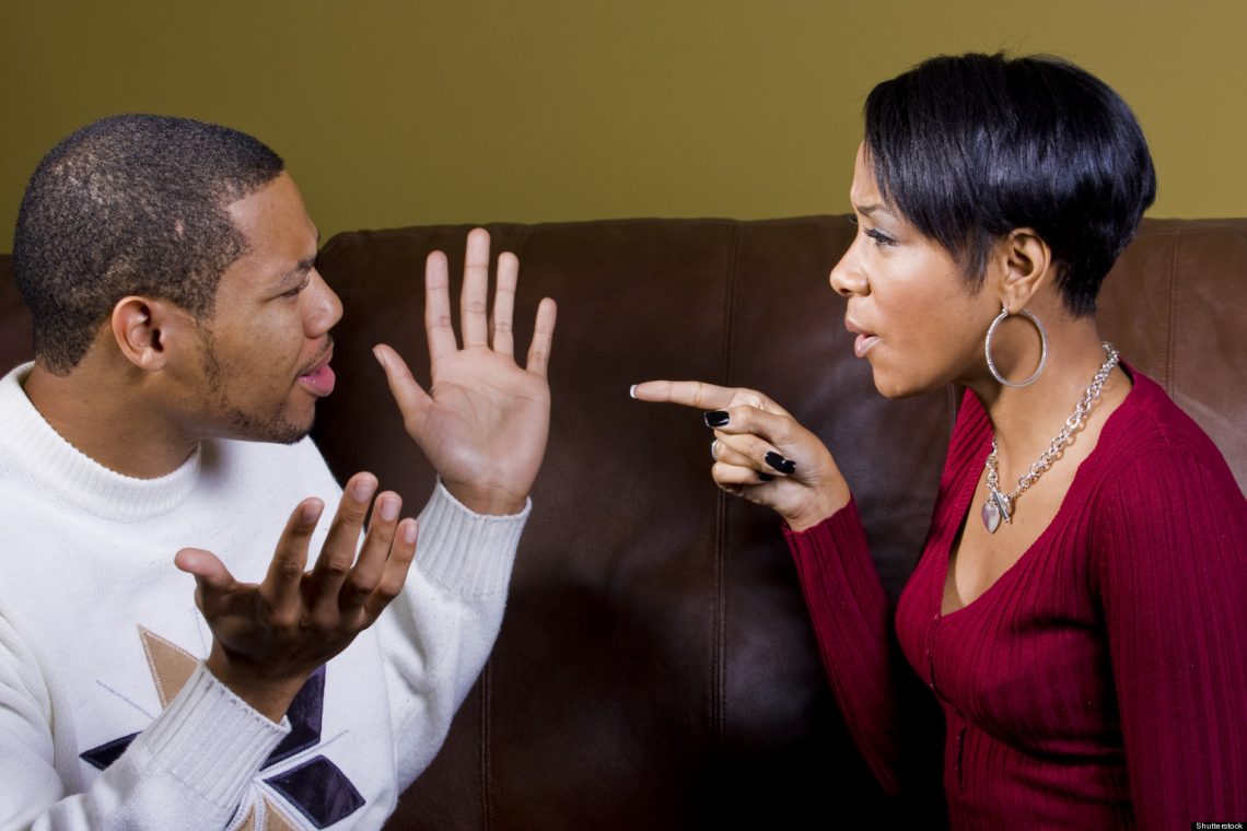 things you don't tell your girlfriend --  wife angry with husband - Shutterstock