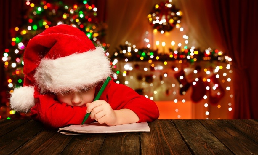 child writing letter to santa