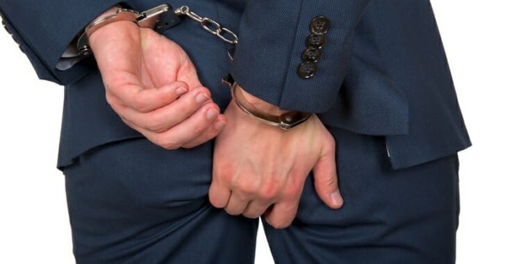 Men's Secrets they keep from women - handcuffed businessman