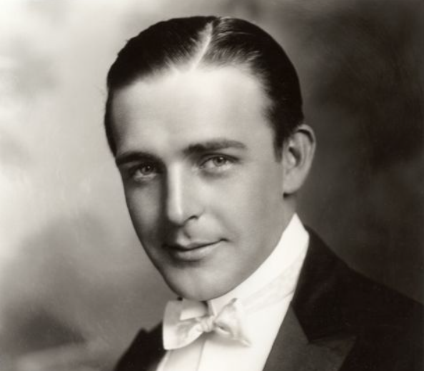 The Hollywood of yesteryear had more than its fair share of career implosions such as Fatty Arbuckle and Harry Langdon but few can match Wallace Reid. Described as "the screen's most perfect lover", he was an all-round athlete and musician who wanted to move from theatre to film. He approached Vitagraph Studios with a story hoping he could direct it but the studio jumped on the opportunity to cast the 6-foot blue-eyed Reid as a matinee idol. <br><br>By 1922, he had appeared in nearly 200 pictures and even tried out for the Indy 500. Reid was hiding a secret, however. In 1919, he had been involved in a train wreck and was prescribed morphine for his injuries. As the pressure of stardom grew, he rapidly became addicted regularly spending 1,000 dollars on morphine but audiences noticed his rapid weight loss and gaunt features. <br><br>He collapsed on set in October 1922 and was sent to a sanatorium where he was locked in a padded cell as he tried to detox. He died of influenza on January 19th, 1923 and his death was a huge shock to the public, the first celebrity drug death. 